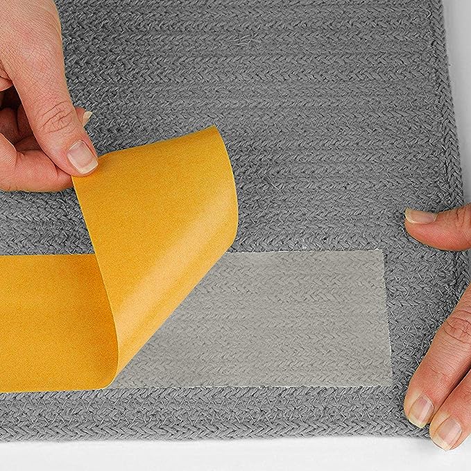 Kahepoolne teip esemete kinnitamiseks