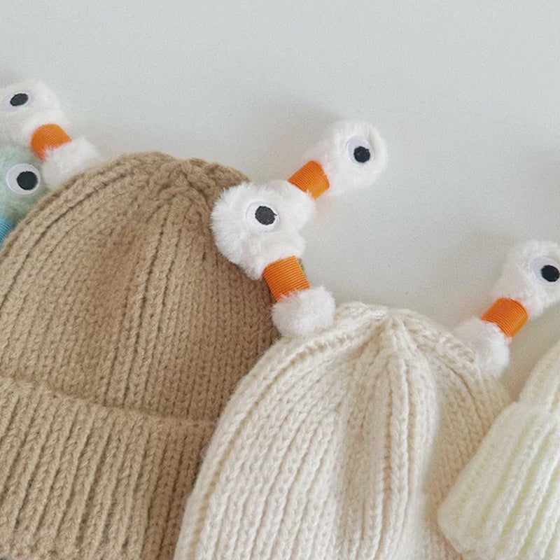 Helendav kootud müts