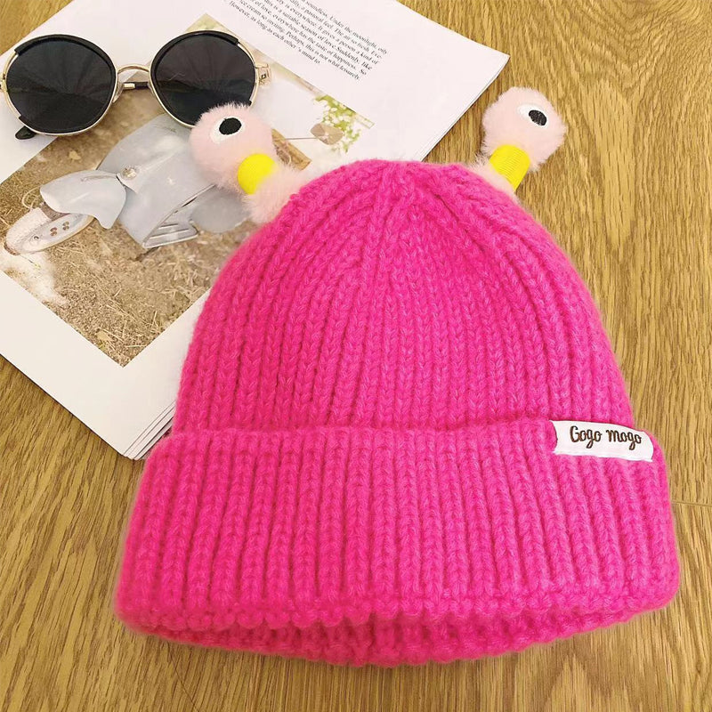 Helendav kootud müts